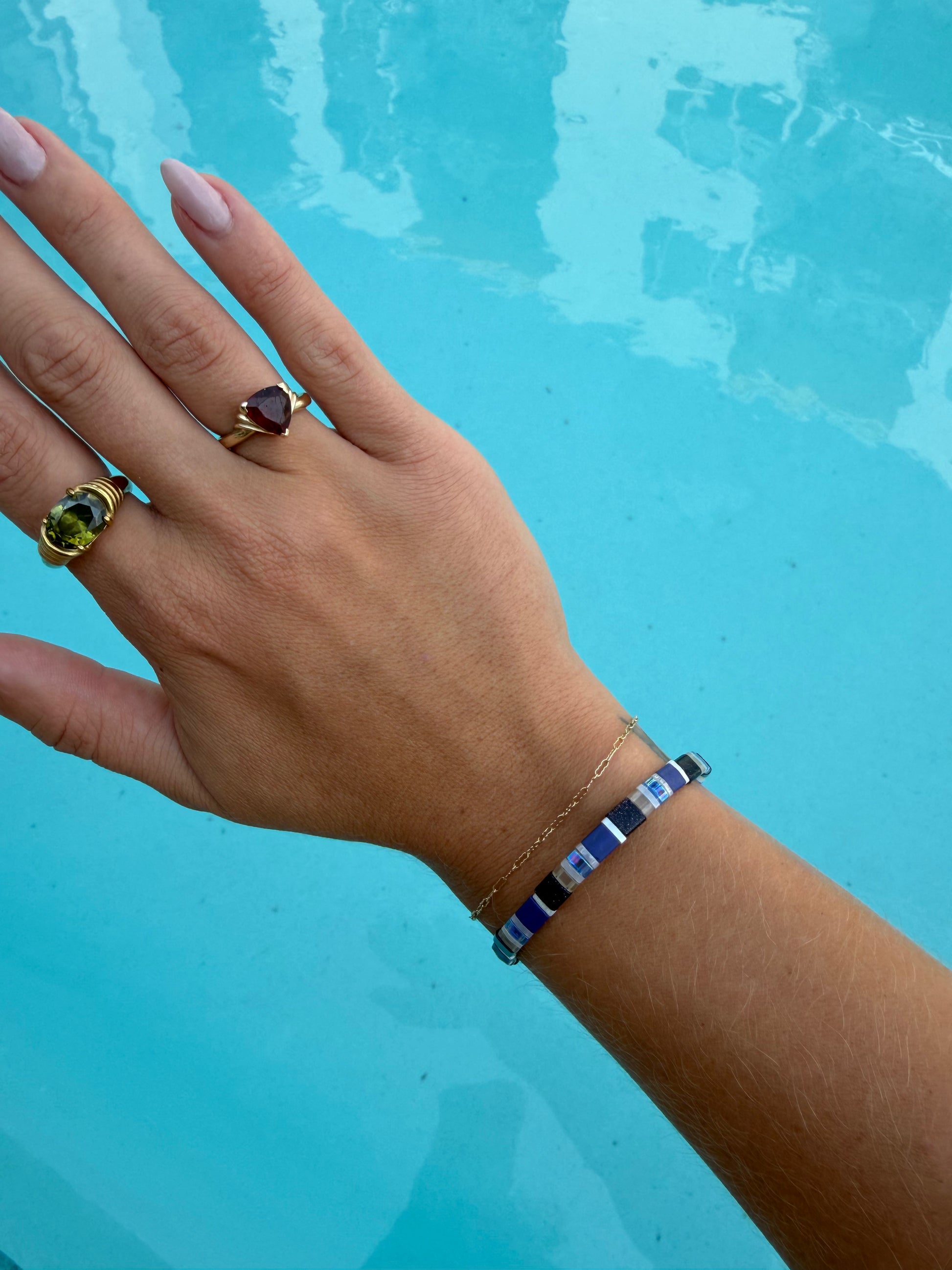 Handmade Spotted Eagle Ray bracelet featuring cobalt blue, navy, black, white, clear, and iridescent glass beads.
