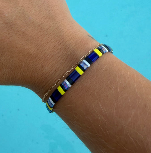 Close-up of the Regal Blue Tang bracelet’s blue, black, and yellow glass-bead pattern.